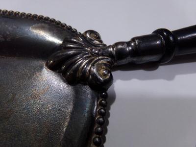 A serving device, maybe for cheese?
