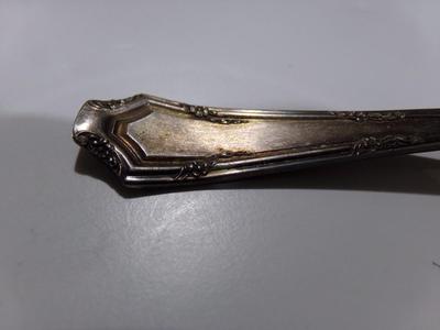 Stratford Silver Co. AXI silver plate. Looks like a sugar server spoon