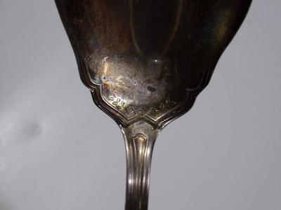 Stratford Silver Co. AXI silver plate. Looks like a sugar server spoon