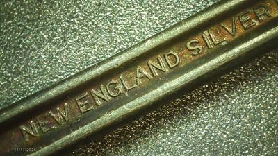 2 New England Silver Plate iced tea spoons.