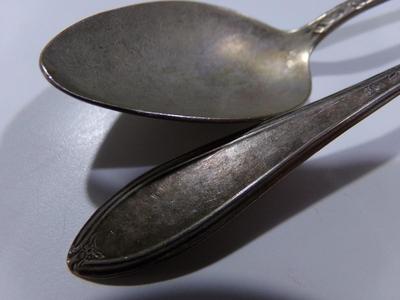 2 New England Silver Plate iced tea spoons.