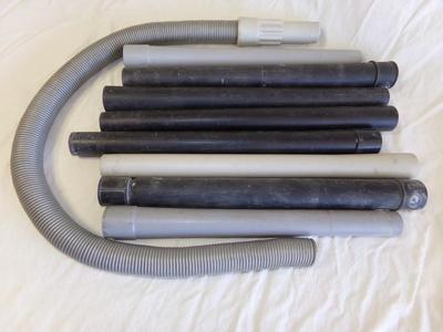 Vacuum hose and extension tubes.