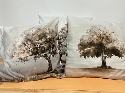 Three throw pillows by Phantoscope 16x16