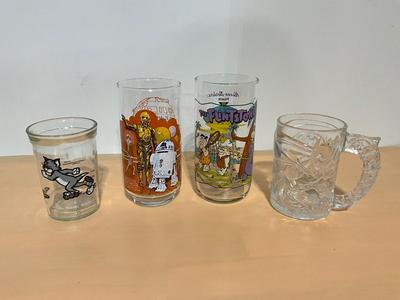 Burger King Flintstones, Star Wars Glasses, McDonald’s Batman Mug, Welch’s Tom&Jerry Jam container.