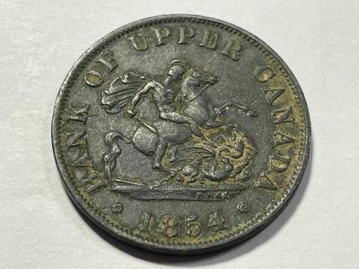 1854 Bank of Upper Canada Half Penny Bank Token in Circulated Condition as Pictured. FREE DOMESTIC SHIPPING.