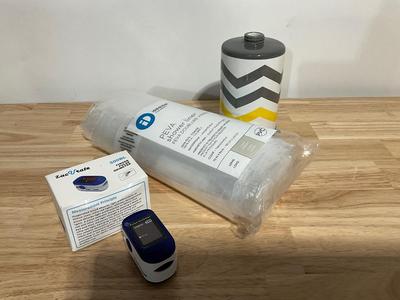 Bathroom items, including ZacVrate Finger Pulse Oximeter