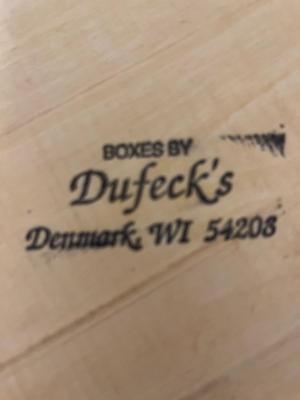 The Snooty Piggy, a tray and Dufeck’s box