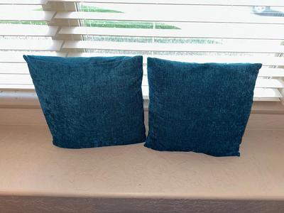 THROW PILLOWS AND A FOOT STOOL