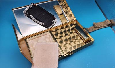 Gold Embossed Metal Vanity Purse