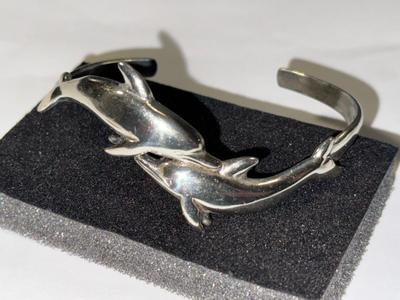 VINTAGE PREOWNED STERLING SILVER FIGURAL DOLPHIN CUFF BRACELET 17.7 GRAMS TW STANDARD SIZE 7".