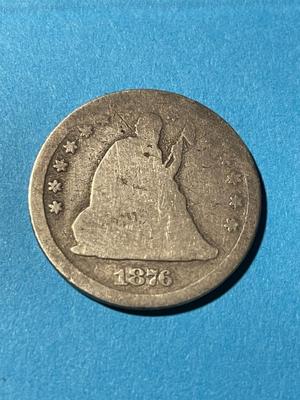 1876-CC (CARSON CITY) CIRCULATED CONDITION LIBERTY SEATED SILVER QUARTER AS PICTURED.