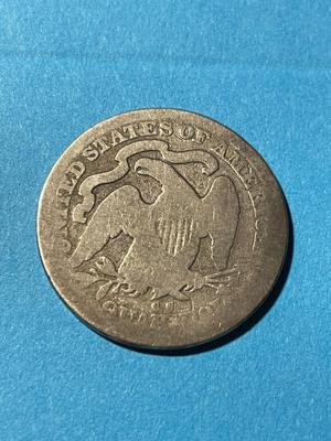 1876-CC (CARSON CITY) CIRCULATED CONDITION LIBERTY SEATED SILVER QUARTER AS PICTURED.