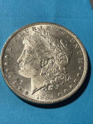 1884-O UNCIRCULATED CONDITION MORGAN SILVER DOLLAR (COIN-1) AS PICTURED. FREE DOMESTIC SHIPPING.