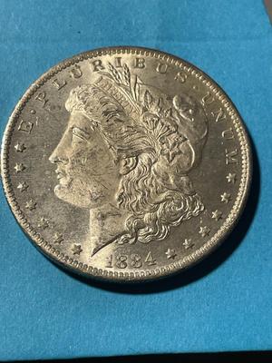 1884-O UNCIRCULATED CONDITION MORGAN SILVER DOLLAR (COIN-2) AS PICTURED. FREE DOMESTIC SHIPPING.