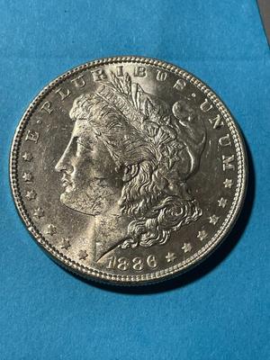 1886-P UNCIRCULATED CONDITION MORGAN SILVER DOLLAR (COIN-3) AS PICTURED. FREE DOMESTIC SHIPPING.