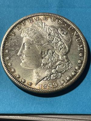 1899-O UNCIRCULATED CONDITION MORGAN SILVER DOLLAR (COIN-6) AS PICTURED. FREE DOMESTIC SHIPPING.