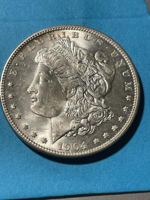 1904-O UNCIRCULATED CONDITION MORGAN SILVER DOLLAR (COIN-12) AS PICTURED. FREE DOMESTIC SHIPPING.