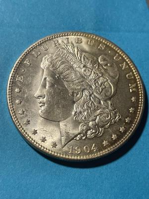 1904-O UNCIRCULATED CONDITION MORGAN SILVER DOLLAR (COIN-13) AS PICTURED. FREE DOMESTIC SHIPPING.