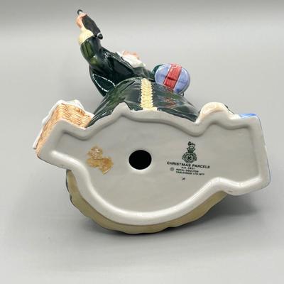 LOT 23D: Royal Doulton Figurine - Christmas Parcels
