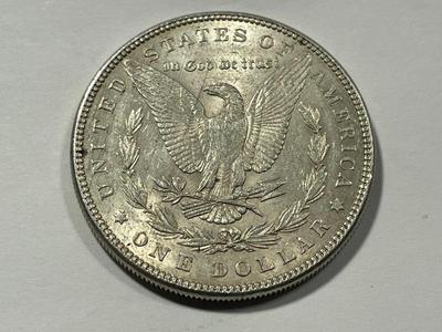 1885-P AU CONDITION MORGAN SILVER DOLLAR AS PICTURED. FREE DOMESTIC SHIPPING.