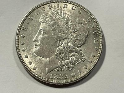 1885-P AU CONDITION MORGAN SILVER DOLLAR AS PICTURED. FREE DOMESTIC SHIPPING.