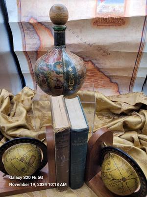 Leather wrapped decanter and book ends