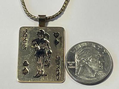 Vintage SIMMONS Gold-tone Joker Pendant on a 20" Chain in Good Preowned Condition.