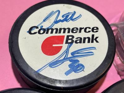 (7) PHILADELPHIA FLYERS NHL HOCKEY PUCKS 6 OF 7 PUCKS ARE PLAYER SIGNED AS PICTURED.
