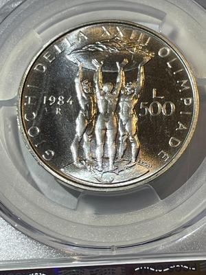 PCGS CERTIFIED ITALY 1984-R MS65 500 Lire Olympics Los Angeles Silver Coin KM-114 as Pictured.