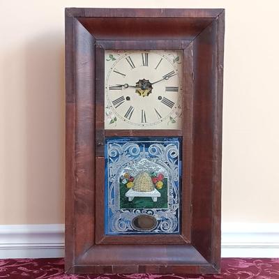 LOT 49: Antique New Haven Clock Co. Reverse Painted Thirty Hour Shelf Clock