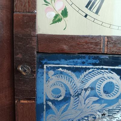 LOT 49: Antique New Haven Clock Co. Reverse Painted Thirty Hour Shelf Clock
