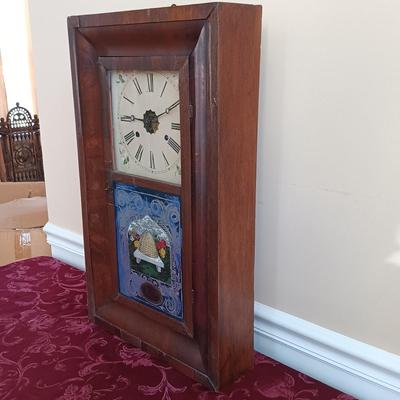 LOT 49: Antique New Haven Clock Co. Reverse Painted Thirty Hour Shelf Clock