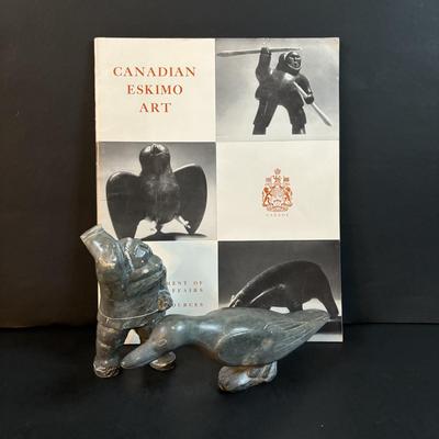 LOT 64: Pair of Carved Inuit Sculptures and Canadian Eskimo Art Book