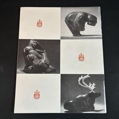 LOT 64: Pair of Carved Inuit Sculptures and Canadian Eskimo Art Book