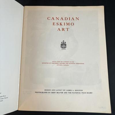 LOT 64: Pair of Carved Inuit Sculptures and Canadian Eskimo Art Book