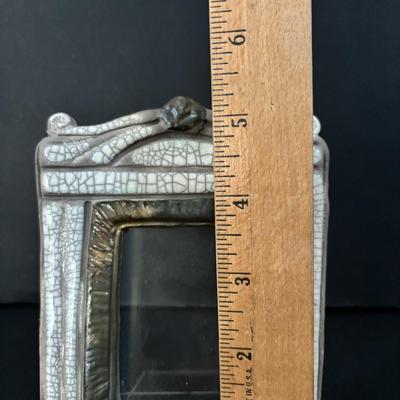 LOT 98: Raku Art Studio Pottery Collection: Picture Frames, Floral Vase w/Flower Frog & Clock Tower