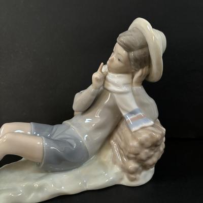 LOT 101: Lladro "Sheperd with Bird" Porcelain Figurine