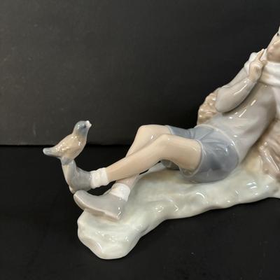 LOT 101: Lladro "Sheperd with Bird" Porcelain Figurine