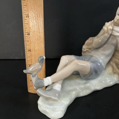 LOT 101: Lladro "Sheperd with Bird" Porcelain Figurine
