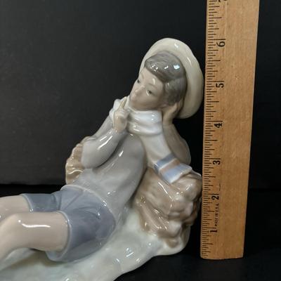LOT 101: Lladro "Sheperd with Bird" Porcelain Figurine