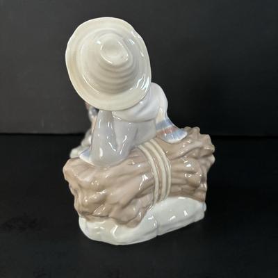 LOT 101: Lladro "Sheperd with Bird" Porcelain Figurine