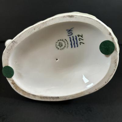 LOT 102: Royal Copenhagen Figurine #772: Boy with Stubborn Calf