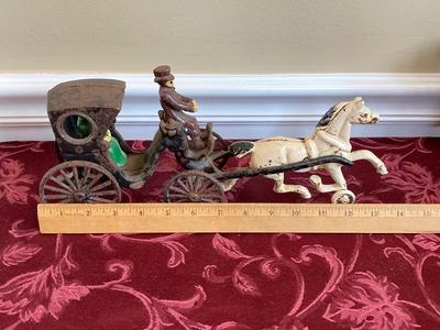 LOT 180: Vintage / Antique Cast Iron Horse and Carriage with Driver and Passenger