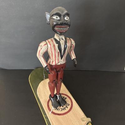 LOT 191: Antique Early 20th Century Dancing Minstrel Black Americana Toy