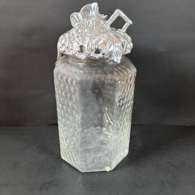 LOT 203: Arthur Court Grape Cluster Canister, Ragazzi & Co. Bottle Stoppers, Grape Cluster Bottle Coasters, Black Stemware w/Matching...