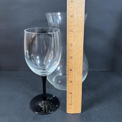 LOT 203: Arthur Court Grape Cluster Canister, Ragazzi & Co. Bottle Stoppers, Grape Cluster Bottle Coasters, Black Stemware w/Matching...