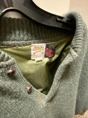 SIZE 10 CABELA’S BOOTS, WINDPROOF SWEATER, ORVIS HUNTING VEST, DUCK CALL & GLOVES