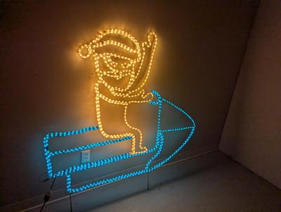 Festive Lights Santa Snowmobile Lawn Decor