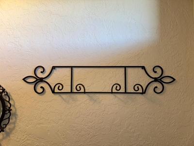 IRON WALL HUNG COAT RACK AND MIRROR PLUS A SIGN