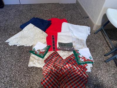 TABLECLOTHS , FESTIVE NAPKINS, AND OTHER PRETTY TABLE ACCENTING PEICES